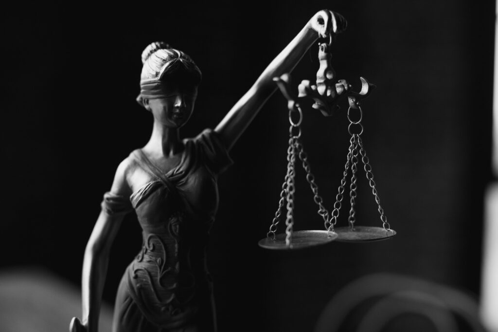 Female sculpture with a balance scale