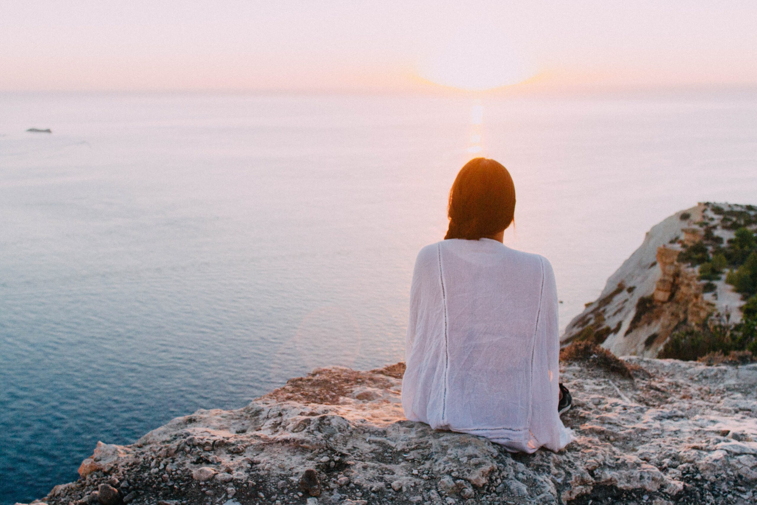 Relaxing on the rocks at sunset